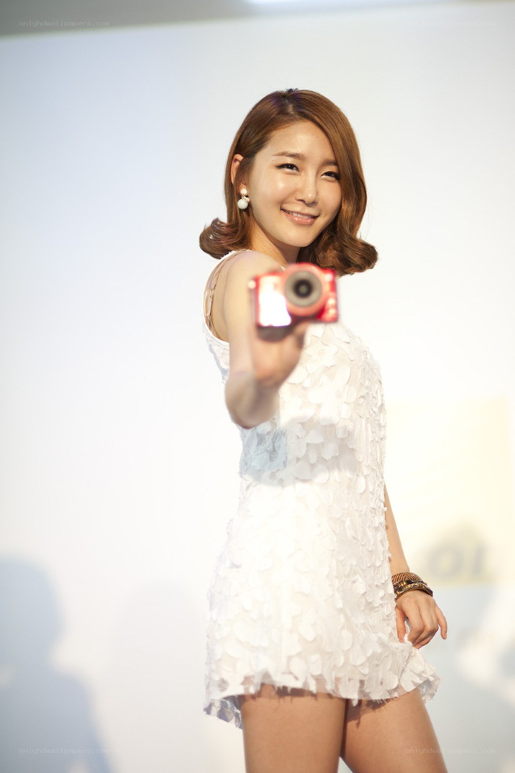 woman holding camera
