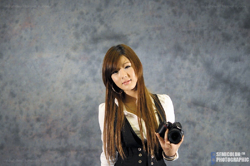 woman holding camera