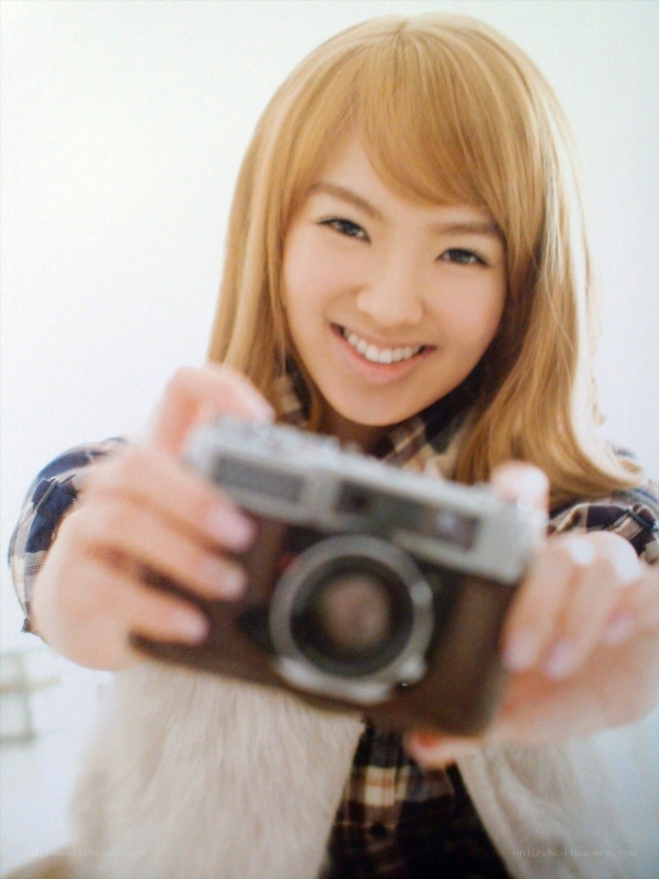 woman holding camera