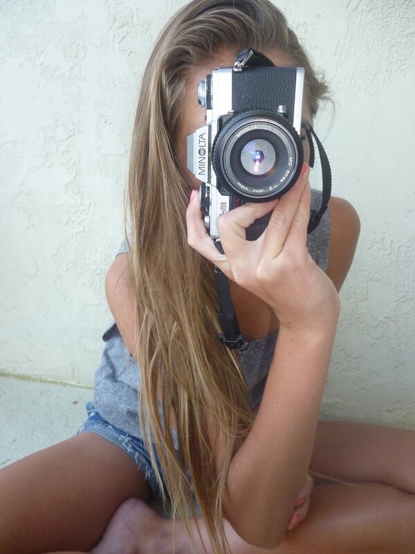 woman holding camera