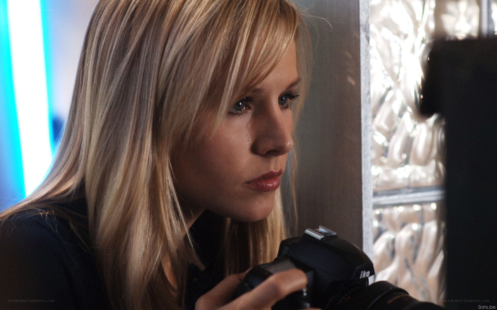 woman holding camera