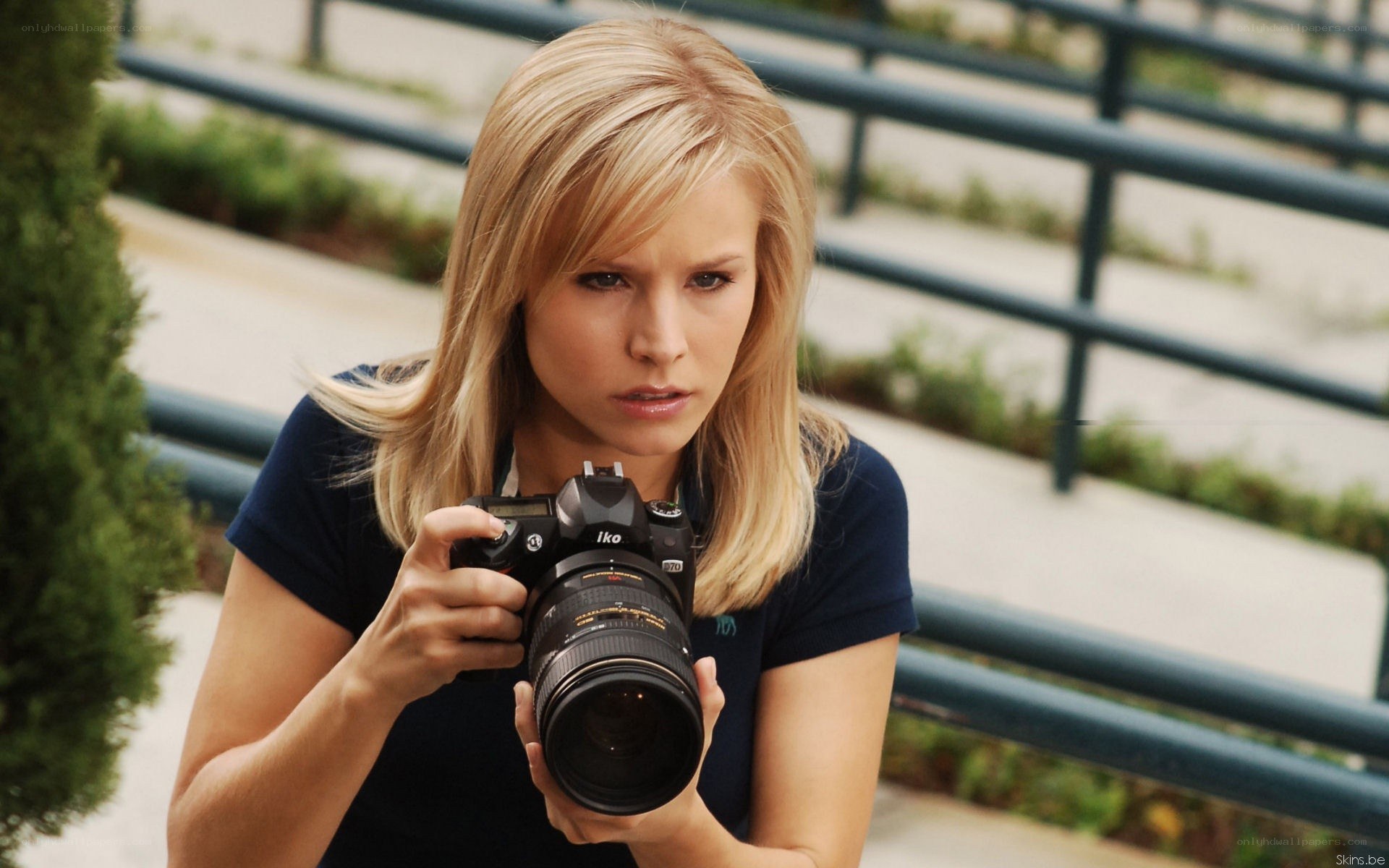 woman holding camera