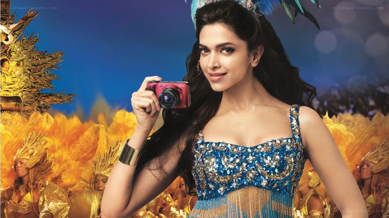 woman holding camera at carnival