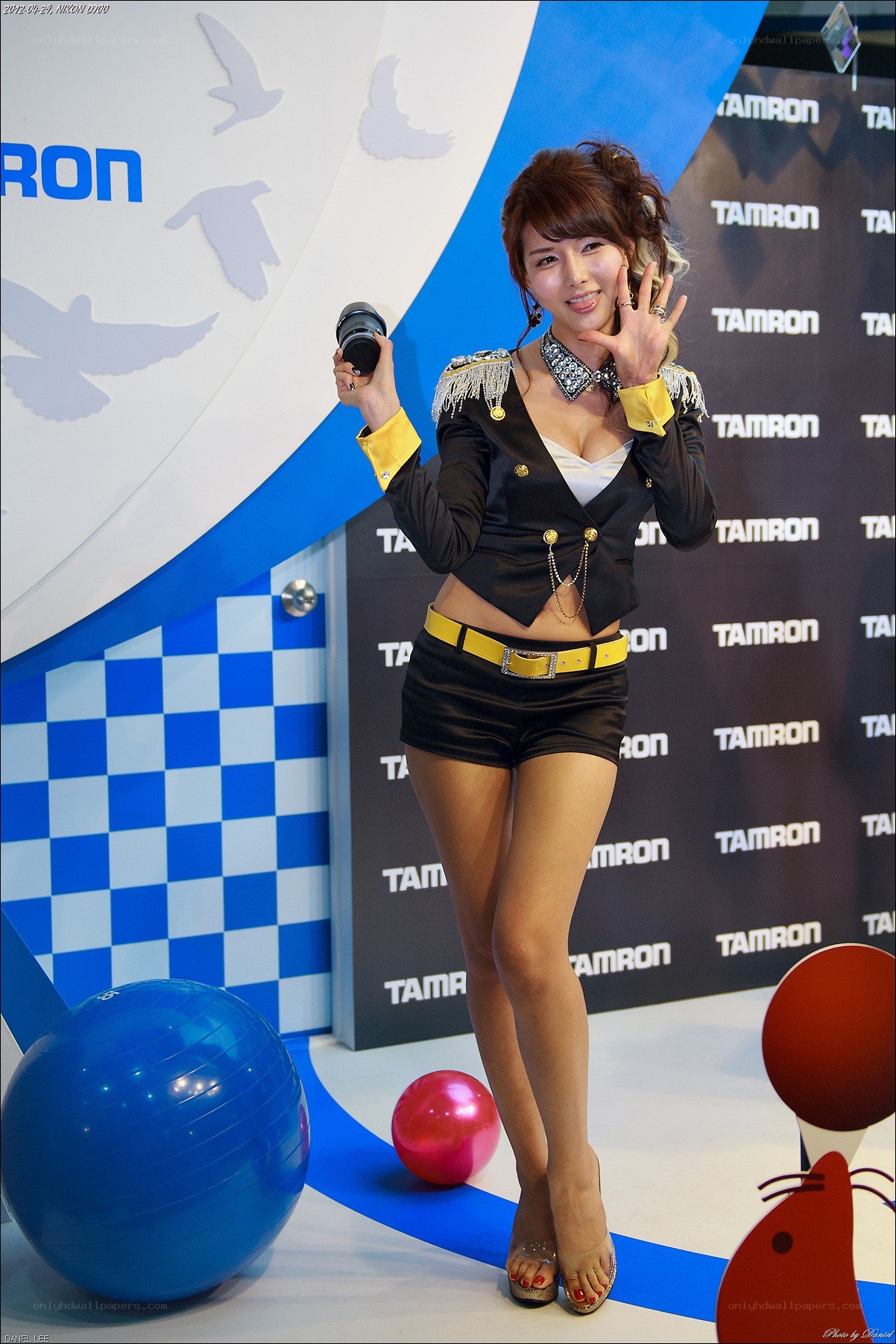 woman holding camera at event