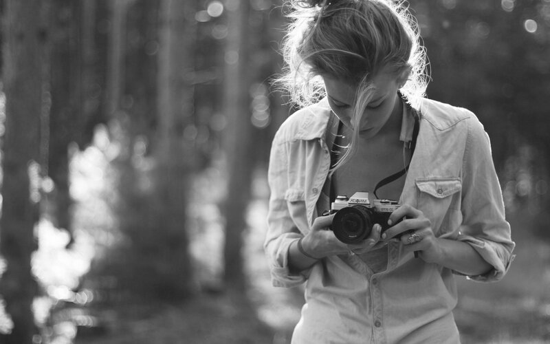 Woman Holding Camera — Black, Calm, Afternoon, Photograph