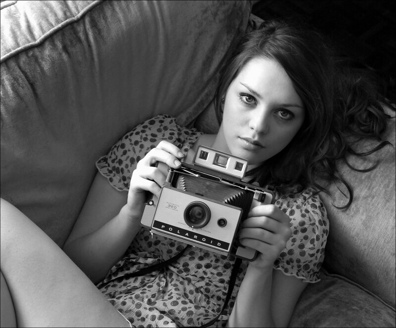 Woman Holding Camera — Black, Calm, Photograph, Couch