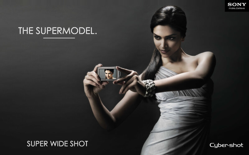 Woman Holding Camera — Black, Dramatic, Photograph, Dress