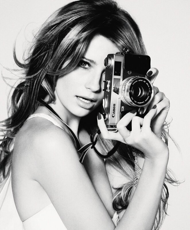Woman Holding Camera — Black, Dramatic, Photograph, Hair, Dress