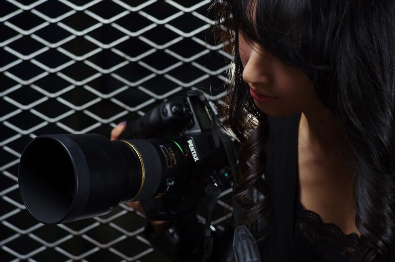 Woman Holding Camera — Black, Dramatic, Photograph, Lens
