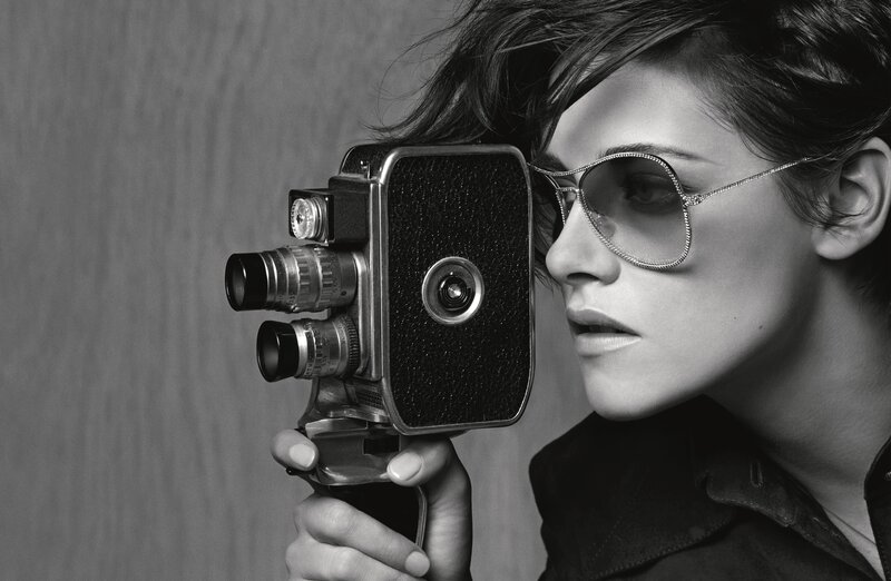 Woman Holding Camera — Black, Dramatic, Photograph, Sunglasses