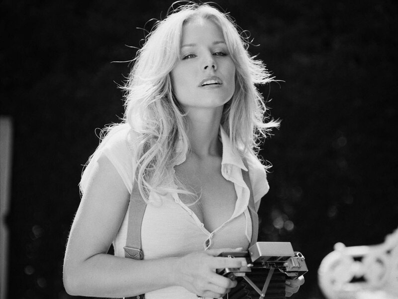Woman Holding Camera — Black, Dramatic, Photograph