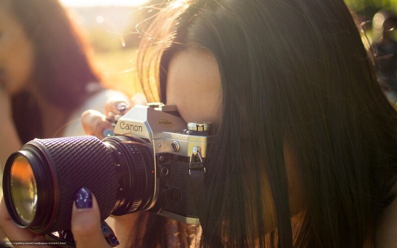 Woman Holding Camera — Brown, Warm