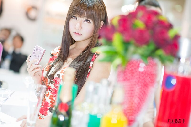 Woman Holding Camera — Red, Calm, Photograph