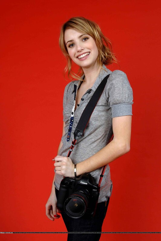 Woman Holding Camera — Red, Friendly