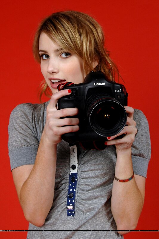 Woman Holding Camera — Red, Neutral