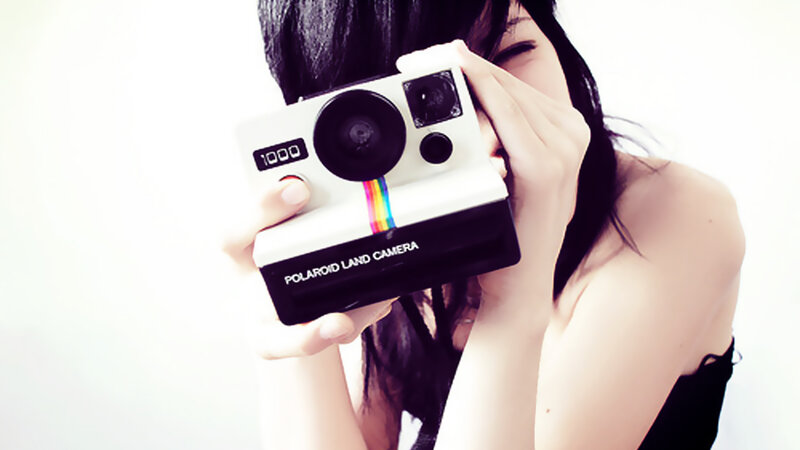 Woman Holding Camera — White, Playful