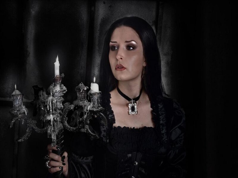 Woman Holding Candelabra — Black, Dramatic
