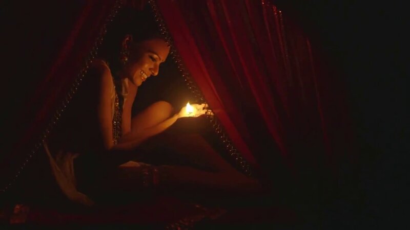 Woman Holding Candle — Red, Dramatic