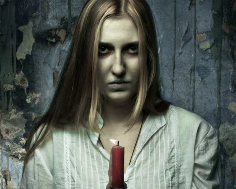 Woman Holding Candle — White, Dramatic