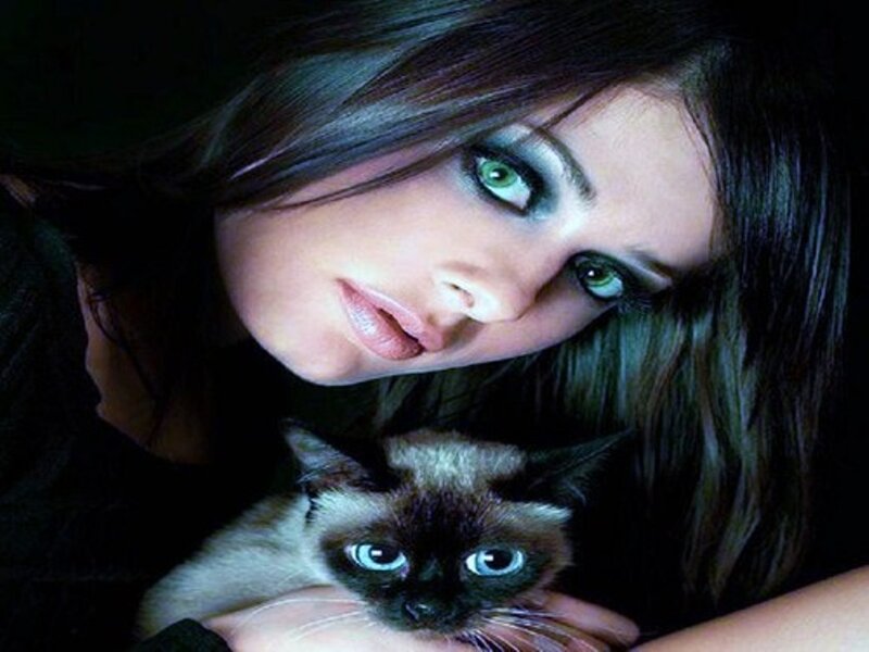 Woman Holding Cat — Black, Dramatic