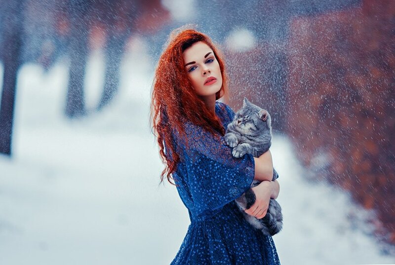 Woman Holding Cat — Blue, Dramatic