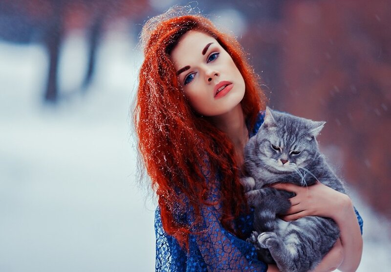 Woman Holding Cat — Red, Calm, Winter
