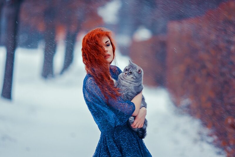 Woman Holding Cat — Red, Dramatic