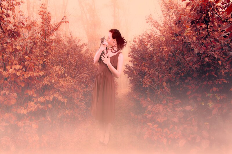 Woman Holding Cat — Red, Serene