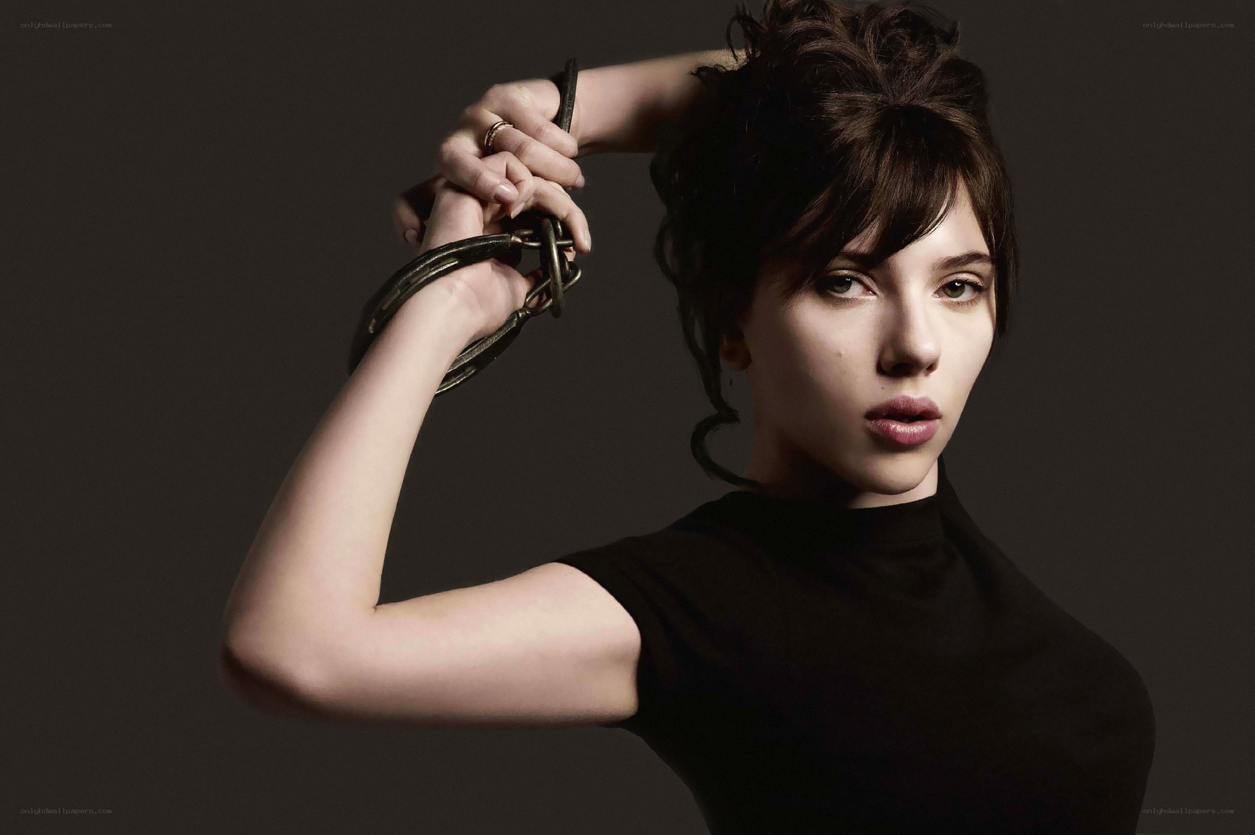 woman holding chains