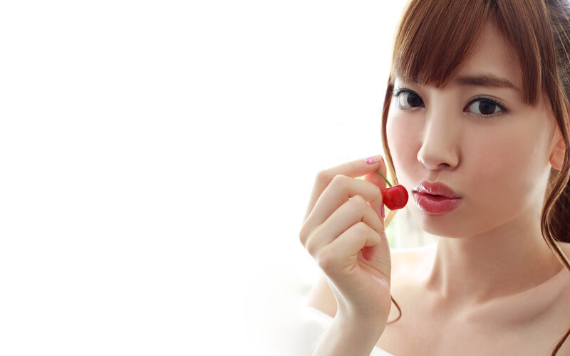 Woman Holding Cherry — White
