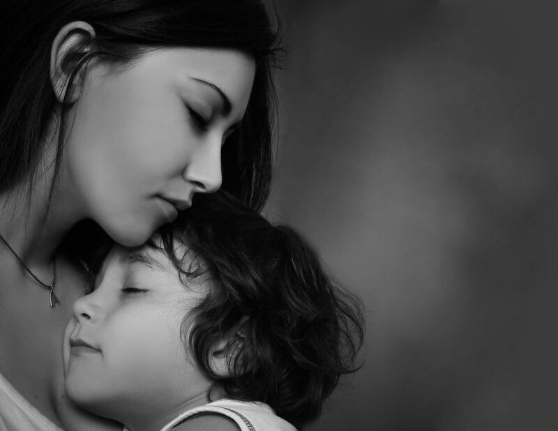 Woman Holding Child — Black, Serene
