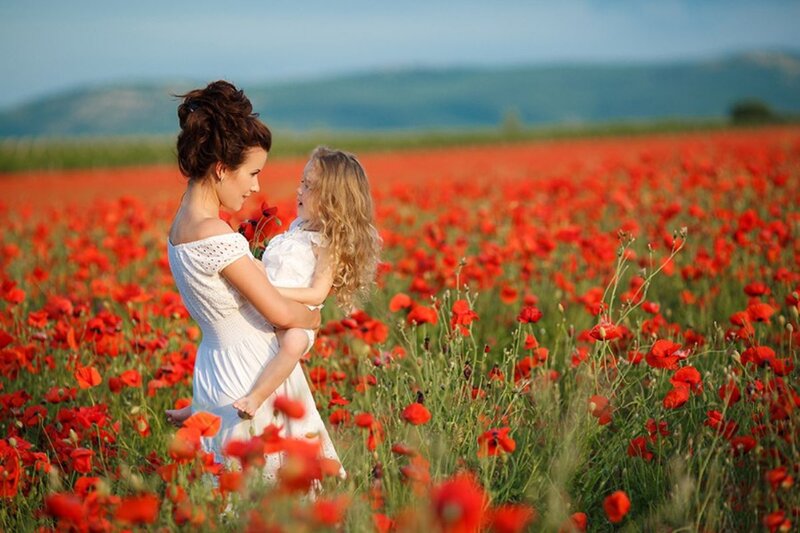 Woman Holding Child — Red, Serene, Afternoon, Photograph
