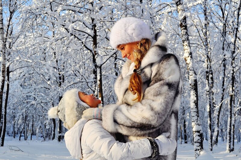 Woman Holding Child — White, Peaceful