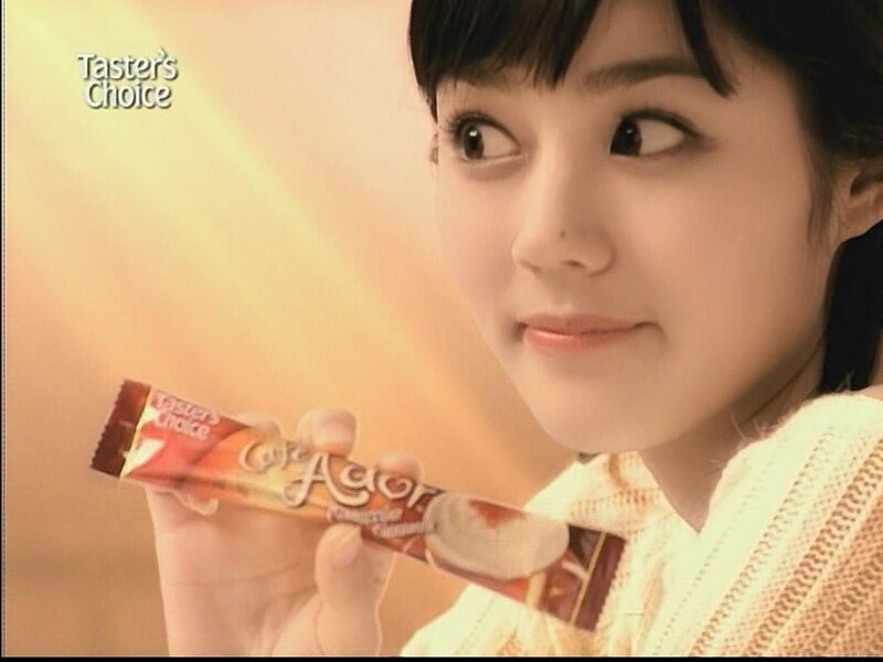 woman holding chocolate bar