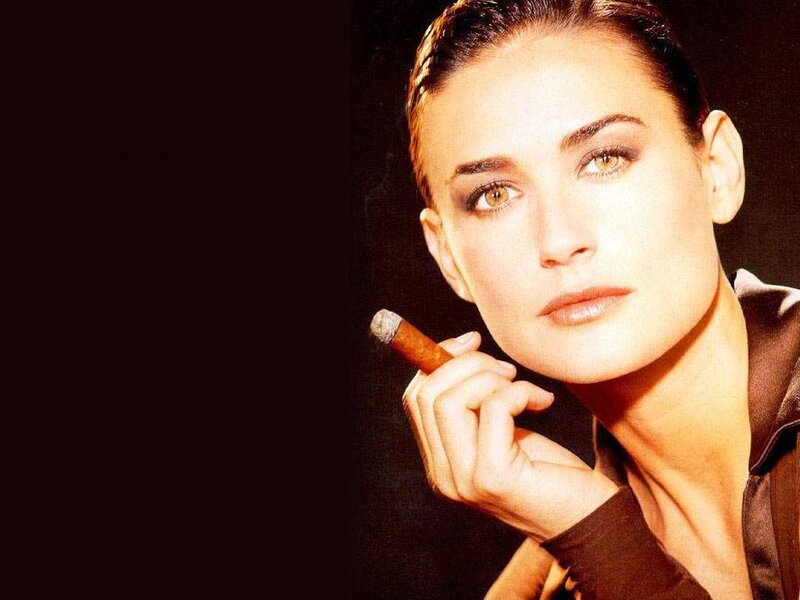 Woman Holding Cigar — Brown