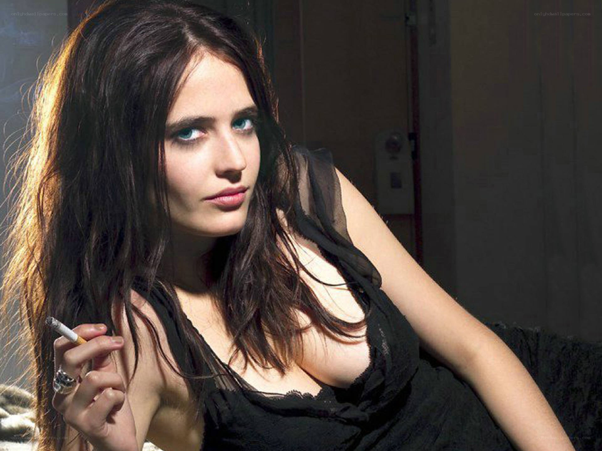 woman holding cigarette