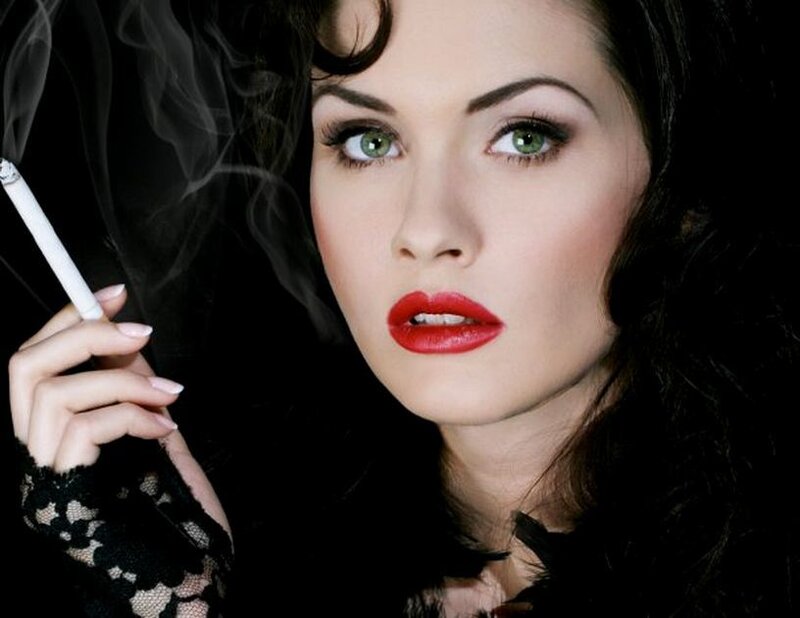 Woman Holding Cigarette — Black