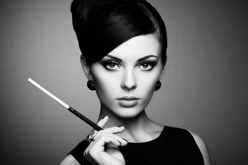 Woman Holding Cigarette Holder