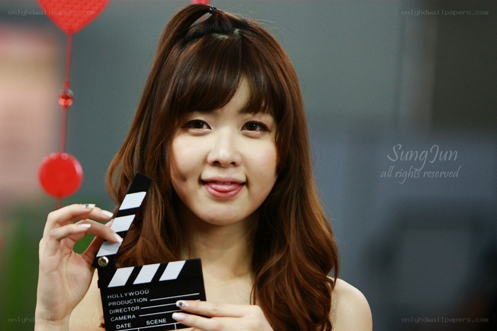 woman holding clapperboard
