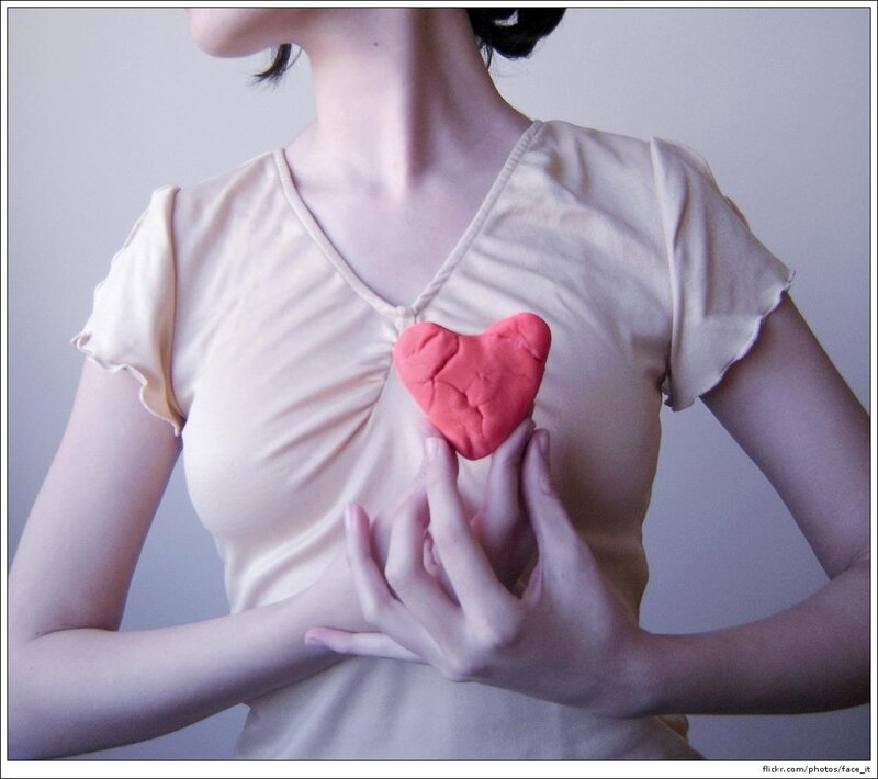 Woman Holding Clay Heart