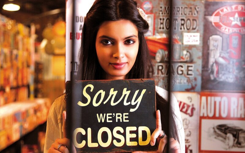 Woman Holding Closed Sign — Black
