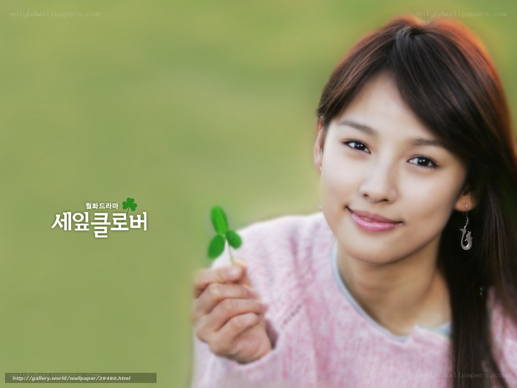 woman holding clover