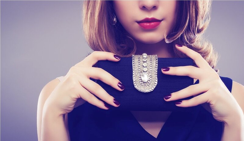 Woman Holding Clutch — Blue