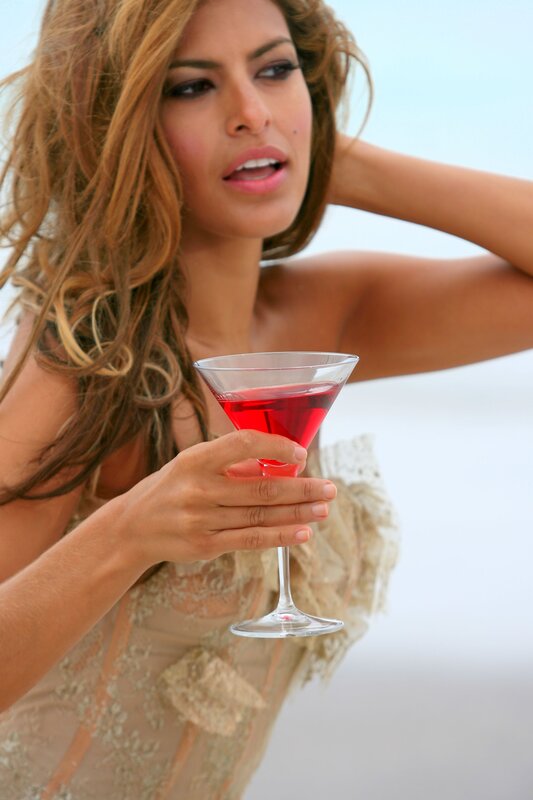 Woman Holding Cocktail — Red, Relaxed