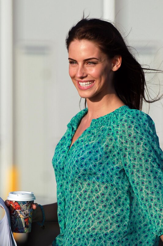 woman holding coffee cup