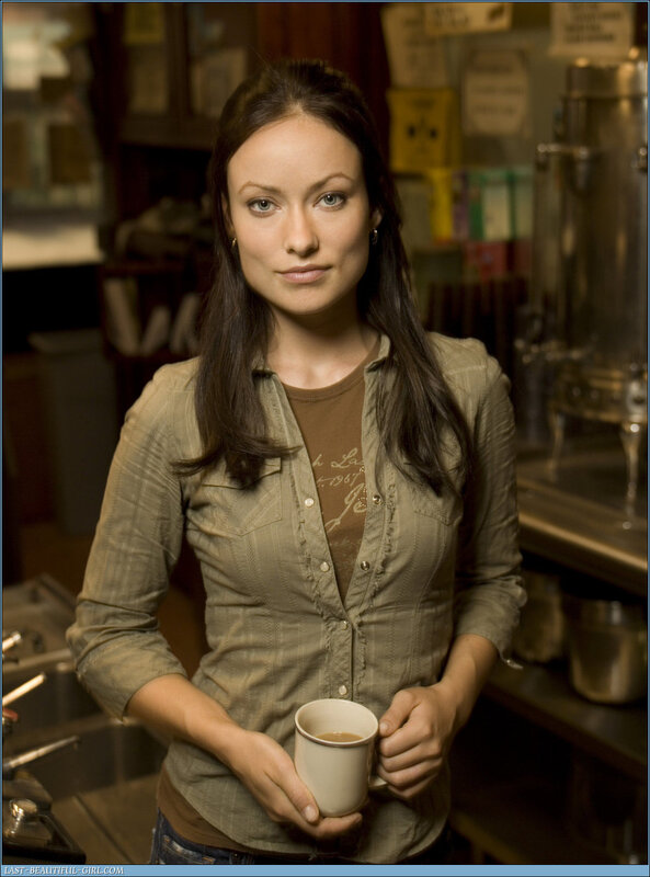 woman holding coffee cup