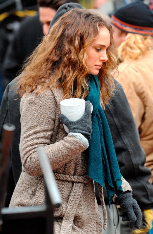 woman holding coffee cup