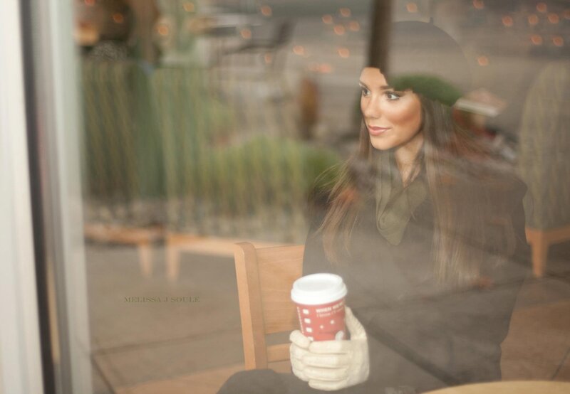 woman holding coffee cup