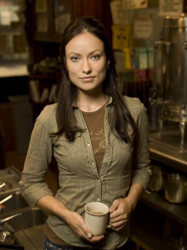 woman holding coffee cup