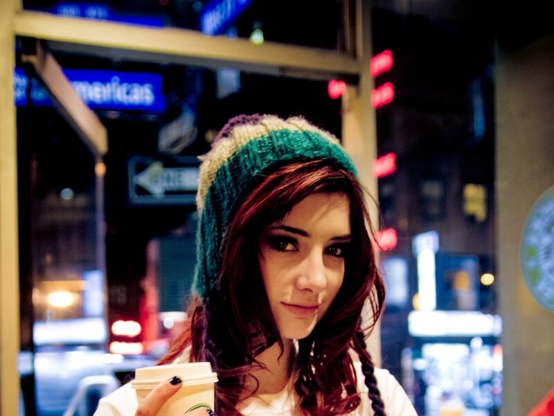 woman holding coffee cup